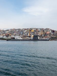 Captivating view of Istanbul's Bosphorus and urban landscape featuring iconic harbor ships.